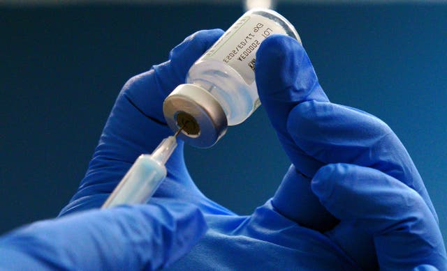 <p>Three different vaccines are on offer from the NHS this autumn (Peter Byrne/PA)</p>