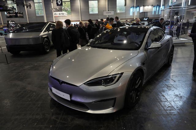 <p>A Tesla Model S is pictured at the Paris Auto Show, in Paris, Monday, Oct. 14, 2024. (AP Photo/Michel Euler)</p>