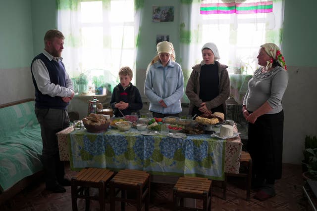 <p>Yuri Strukov, left, his son Ilya, daughters Nina and Daria, and his wife Svetlana Svetlishcheva, right</p>