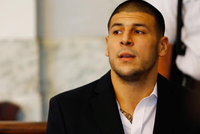 <p>Aaron Hernandez sits in a Massachusetts courtroom in August 2013. Hernandez was diagnosed with CTE after his death four years later. Former NFL players who believe they have CTE are also more likely to be suicidal, according to new research. </p>
