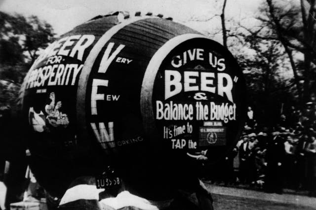 <p>Cash on tap? A giant barrel of beer forms part of a demonstration against prohibition in 1920s America</p>