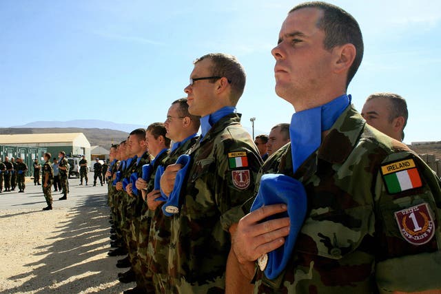 <p>Irish UN peacekeeping soldiers take part in a ceremony at their camp in the southern Lebanese village of Blat, 27 October 2007</p>