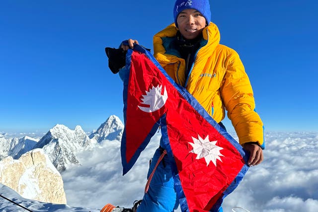 <p>Nima Rinji Sherpa during one of his expeditions in Nepal</p>